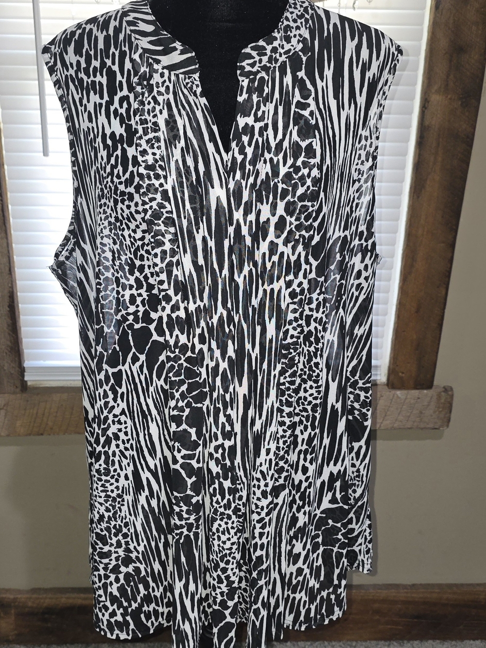 Sleeveless Black & White Animal Print Split-Neck Blouse